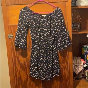 Off the shoulder navy floral romper from Dry Goods